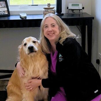 Kristy with her arms around a blog